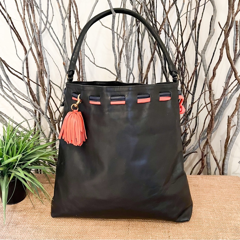 Clare V. Grand Henri Maison Drawstring Bag Black and Orange